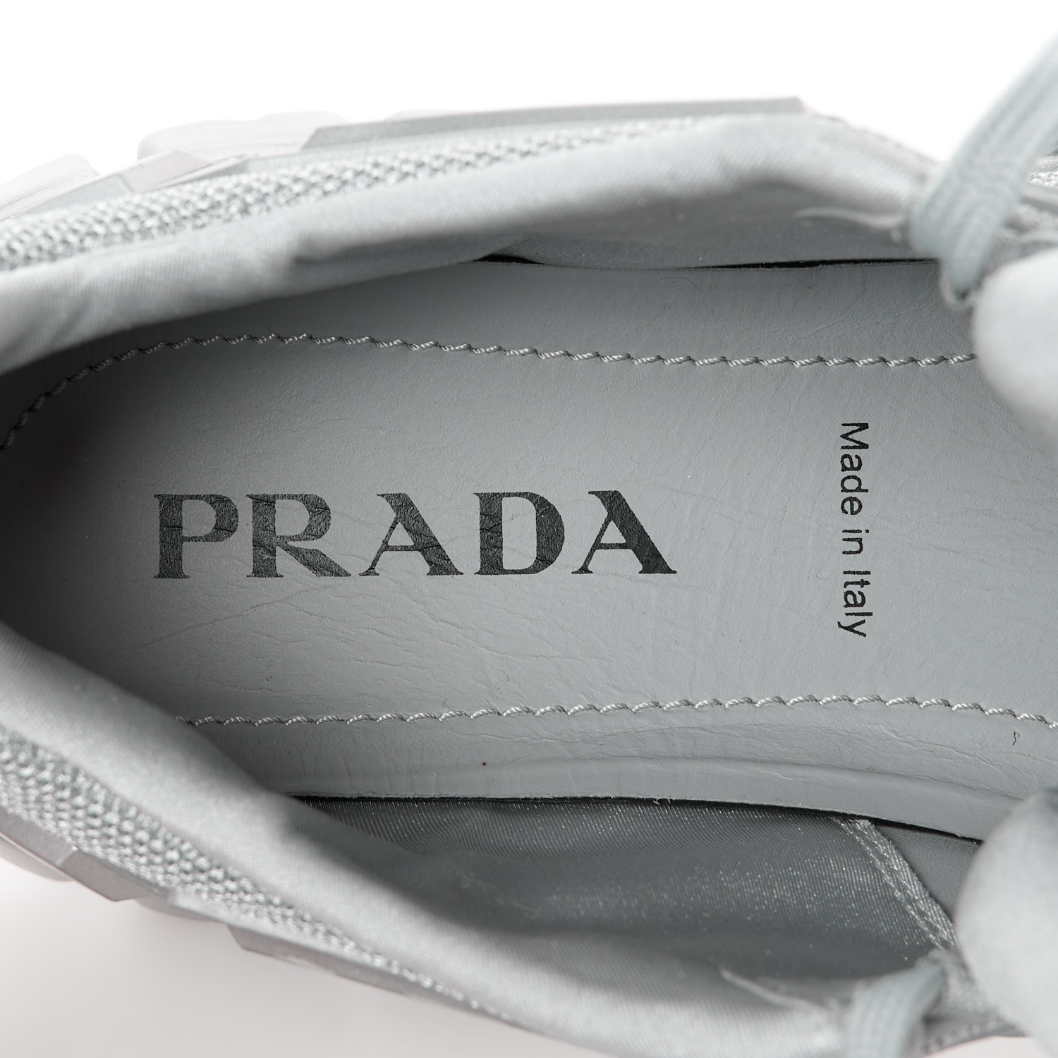 PRADA Rubber Technical Knit Fabric Triangle Logo Evolution