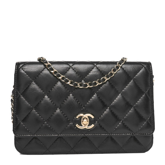 CHANEL Shiny Aged Calfskin Enamel Logo Quilted Wallet On