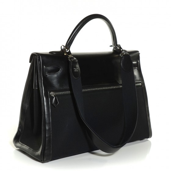 ブラックレザーハンドバッグです 鍵付きkelly style HILTONブラックレザーハンドバッグkelly style - メルカリ
