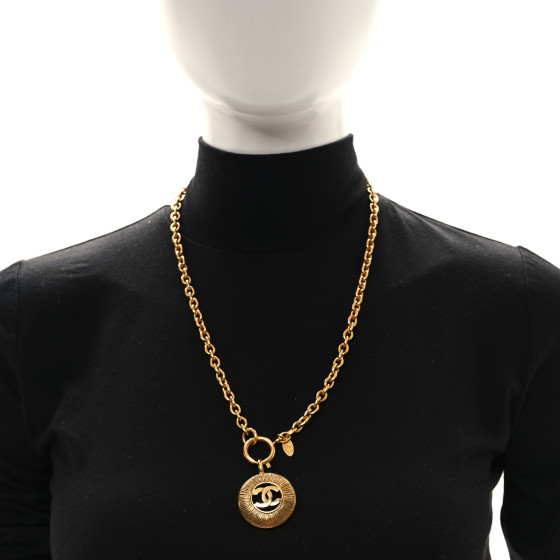 CHANEL Metal Sunburst Cutout CC Necklace Gold