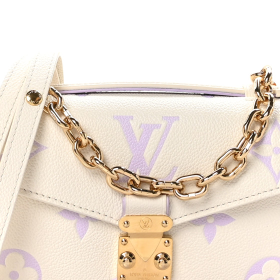 LOUIS VUITTON Empreinte Monogram Giant Pochette Metis East