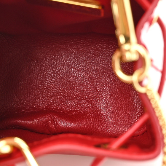 PRADAのポンチョ PRADA Vernice Metal Triangle Logo Mini Drawcord Pouch