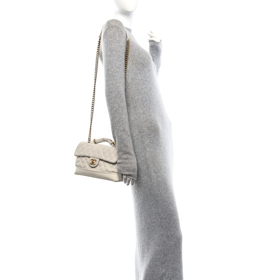 CHANEL Iridescent Caviar Quilted Medium Globe Trotter Flap White