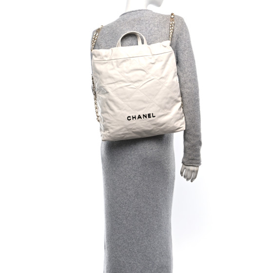 CHANEL Shiny Calfskin Quilted Chanel 22 Backpack White Black