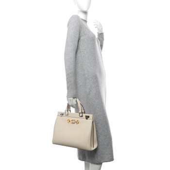GUCCI Grainy Calfskin Medium Zumi Top Handle Bag Mystic White