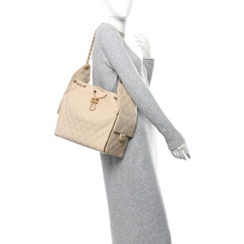 CHANEL Caviar Quilted Medium Chanel 25 Handbag Beige