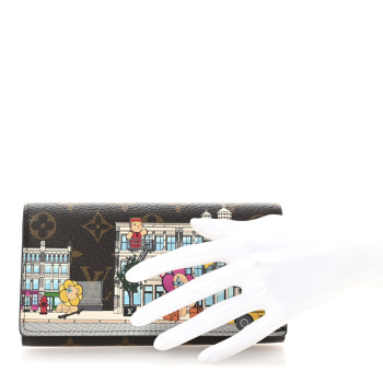 LOUIS VUITTON Monogram 2022 Christmas Animation Sarah Wallet Yellow