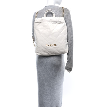 CHANEL Shiny Calfskin Quilted Chanel 22 Backpack White