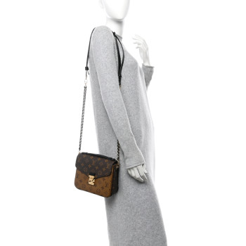 LOUIS VUITTON Reverse Monogram Pochette Metis Backpack