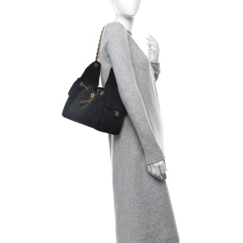 CHANEL Washed Denim Quilted Small Chanel 25 Handbag Black