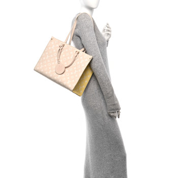 LOUIS VUITTON Empreinte Monogram Spring In The City Onthego MM Beige Pink Yellow