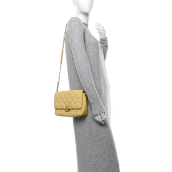 CHANEL Shiny Caviar Quilted Large Chain Melody Flap Yellow