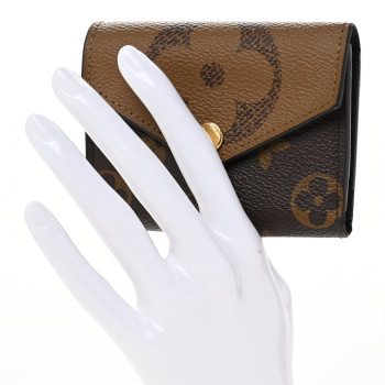 LOUIS VUITTON Reverse Monogram Giant Zoe Wallet