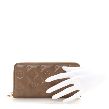 LOUIS VUITTON Lambskin Embossed Monogram Coussin Zippy Wallet Taupe LOUIS VUITTON Lambskin Embossed Monogram Coussin Zippy Wallet Taupe