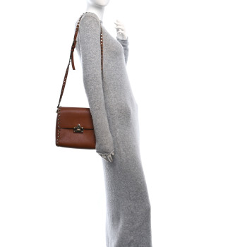 VALENTINO GARAVANI Pebbled Calfskin Rockstud Flip Lock Flap Messenger Saddle Brown