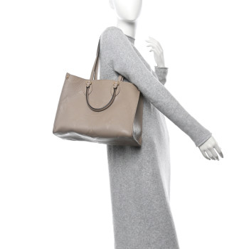 LOUIS VUITTON Empreinte Monogram Giant Onthego MM Tourterelle