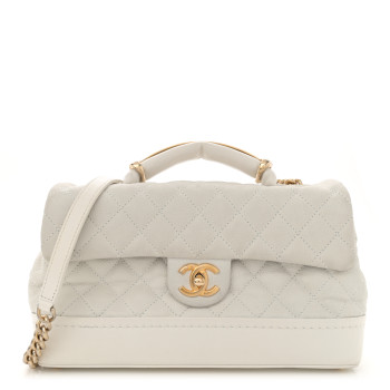 CHANEL Iridescent Caviar Quilted Medium Globe Trotter Flap White