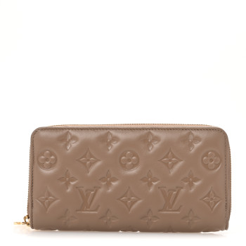 LOUIS VUITTON Lambskin Embossed Monogram Coussin Zippy Wallet Taupe