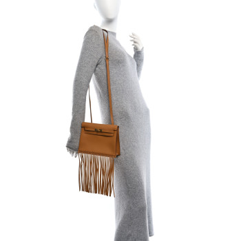 HERMES Swift Kelly Danse Anate Fringed Belt Bag Sesame