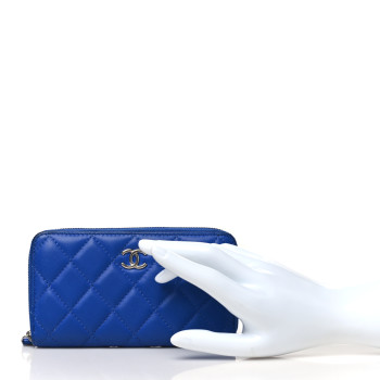 CHANEL Lambskin Quilted Medium Zip Around Wallet Blue