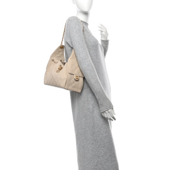CHANEL Caviar Quilted Small Chanel 25 Handbag Beige