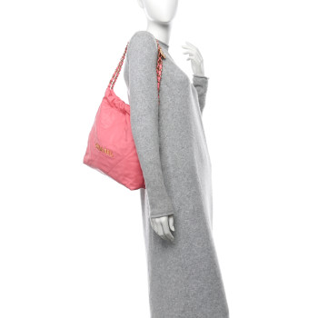 CHANEL Shiny Calfskin Quilted Small Chanel 22 Coral Pink