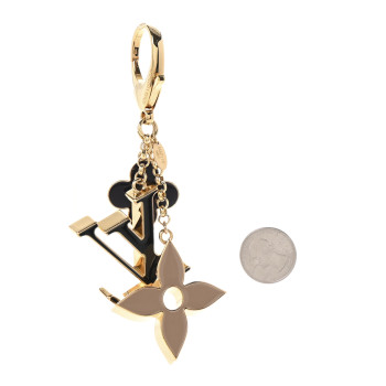 LOUIS VUITTON Metal Enamel Fleur De Monogram Bag Charm Dore