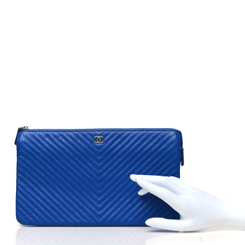 CHANEL Caviar Chevron Quilted Small Zipped Pouch Blue