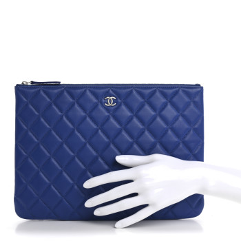 CHANEL Lambskin Quilted Medium Cosmetic Case Blue