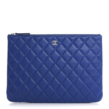 CHANEL Lambskin Quilted Medium Cosmetic Case Blue