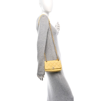 CHANEL Shiny Lambskin Small Chain Is More Flap Yellow