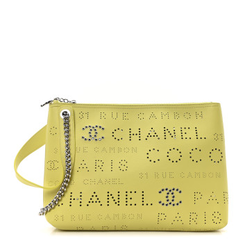 CHANEL Calfskin Eyelets Clutch Yellow