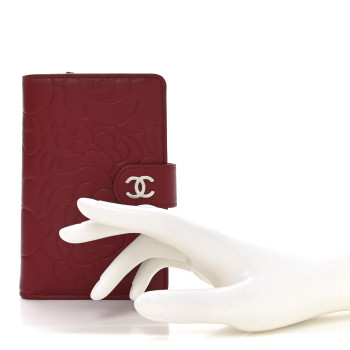 CHANEL Lambskin Camellia Embossed Zipped Pocket Wallet Red