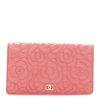 CHANEL Lambskin Camellia Embossed Yen Wallet Pink