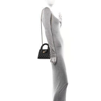 CHANEL Shiny Aged Calfskin Quilted Nano Kelly Shopper Black