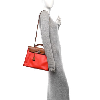 HERMES Toile H Berline Vache Hunter Herbag Zip 31 PM Capucine Fauve