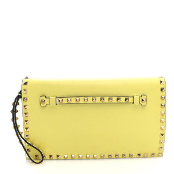 VALENTINO GARAVANI Nappa Rockstud Wristlet Clutch Naples Yellow