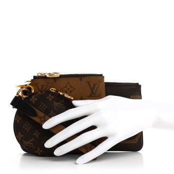 LOUIS VUITTON Reverse Monogram Giant Trio Pouch
