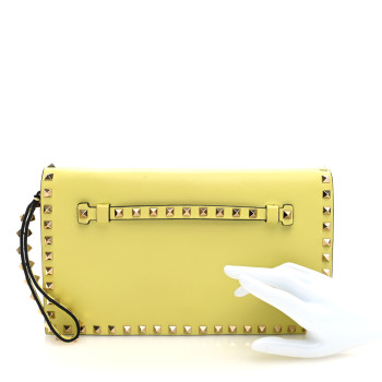 VALENTINO GARAVANI Nappa Rockstud Wristlet Clutch Naples Yellow