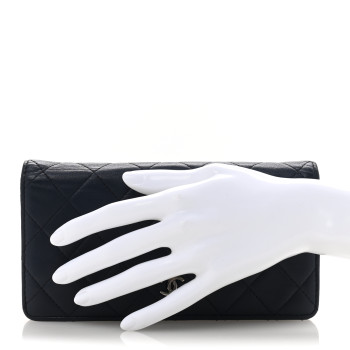 CHANEL Lambskin Quilted Yen Wallet Blue