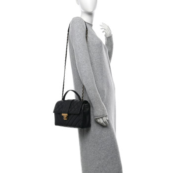 CHANEL Calfskin Quilted Chevron In The City Bag Black
