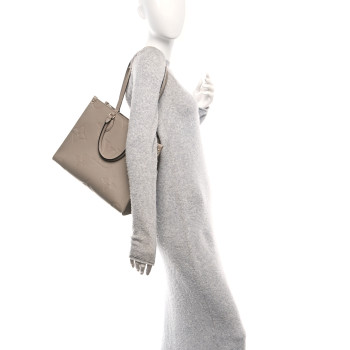 LOUIS VUITTON Empreinte Monogram Giant Onthego MM Tourterelle