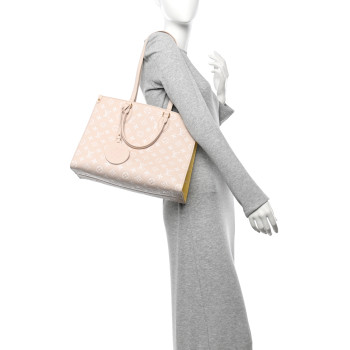 LOUIS VUITTON Empreinte Monogram Spring In The City Onthego MM Beige Pink Yellow