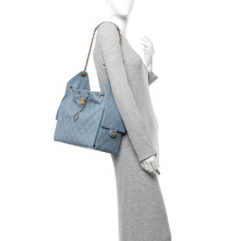 CHANEL Caviar Quilted Medium Chanel 25 Handbag Blue
