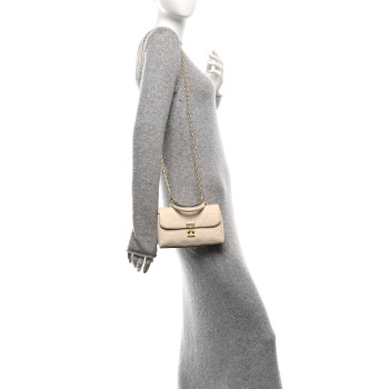 LOUIS VUITTON Empreinte Monogram Nano Madeleine Creme