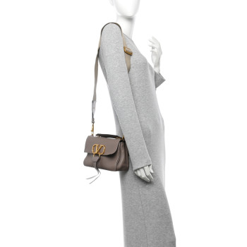 VALENTINO GARAVANI Pebbled Calfskin Small VRing Tassel Shoulder Bag Poudre