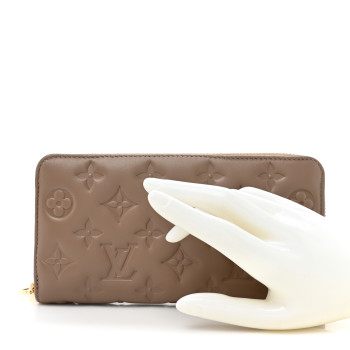 LOUIS VUITTON Lambskin Embossed Monogram Coussin Zippy Wallet Taupe