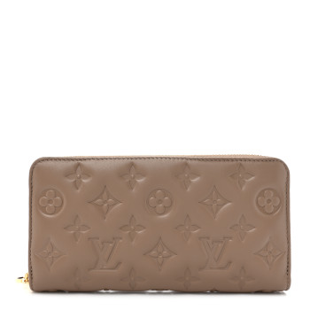 LOUIS VUITTON Lambskin Embossed Monogram Coussin Zippy Wallet Taupe