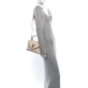 LOUIS VUITTON Calfskin Hold Me New Wave Ivory