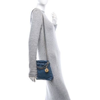 CHANEL Shiny Caviar Quilted Monochrome Mini Chanel 22 Blue
